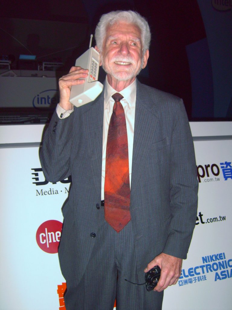 Photo of Marty Cooper with the Motorola DynaTAC.