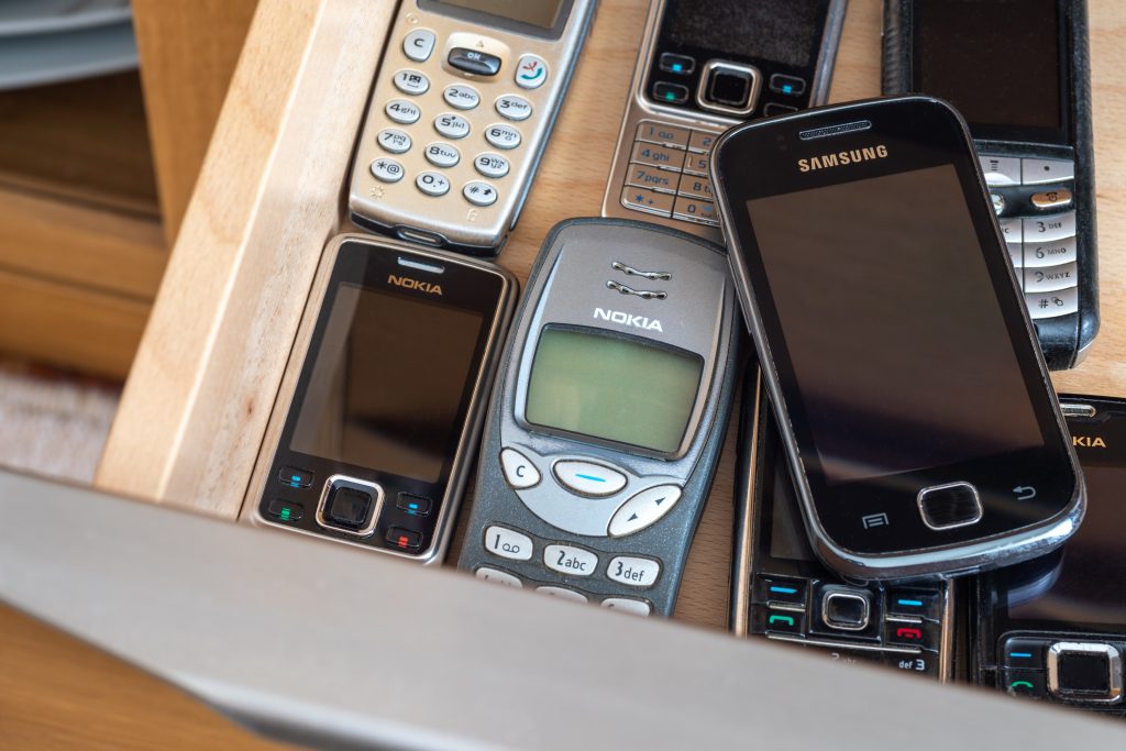 Unused Phones sitting in a drawer