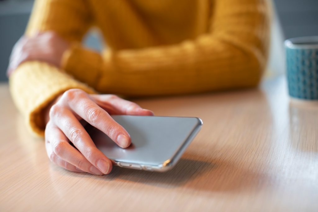 Women putting phone down